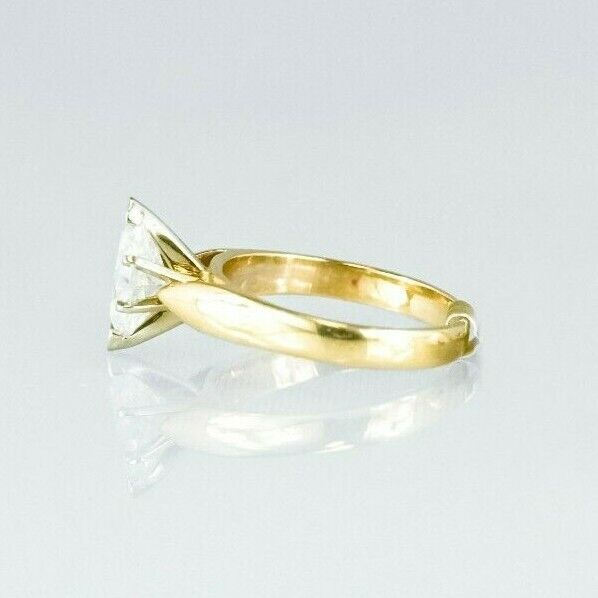 (I-357-546) 14k gold Marquise cut diamond solitaire ring