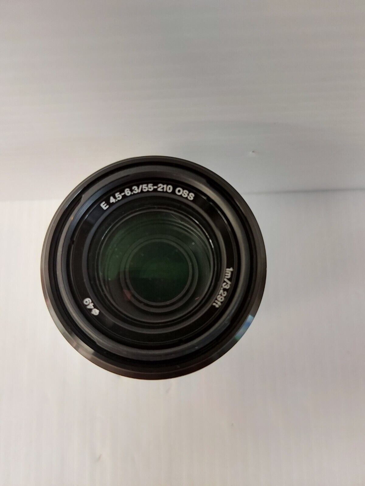 (N85848-3) Sony SEL55210 Optic Steady Shot Lens)