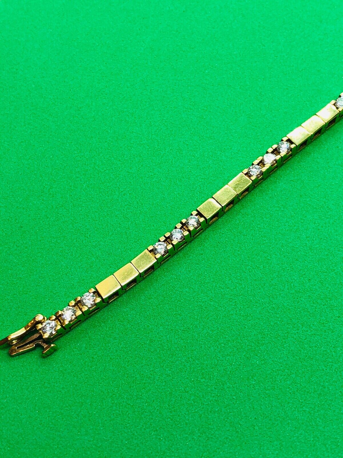 (N049041) Gold/Diamond Tennis Bracelet - 27 Diamonds, 18k Gold, 18.7grams