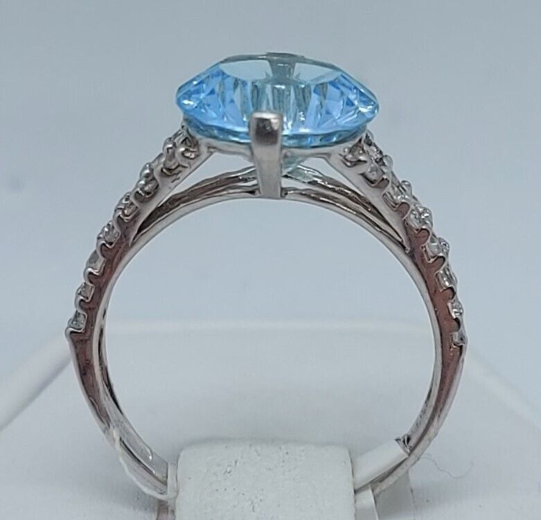 (N13604-3) 10K White Gold Ladies Ring 1 Blue Stone