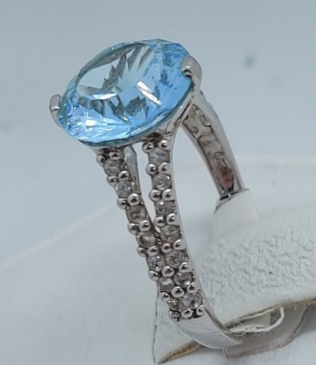 (N13604-3) 10K White Gold Ladies Ring 1 Blue Stone