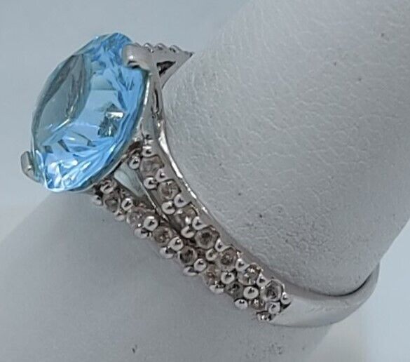 (N13604-3) 10K White Gold Ladies Ring 1 Blue Stone