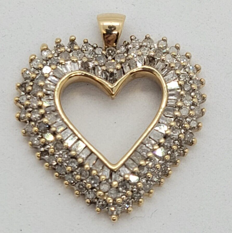 (N67461-1) Ladies 10K Yellow Gold Heart Pendent