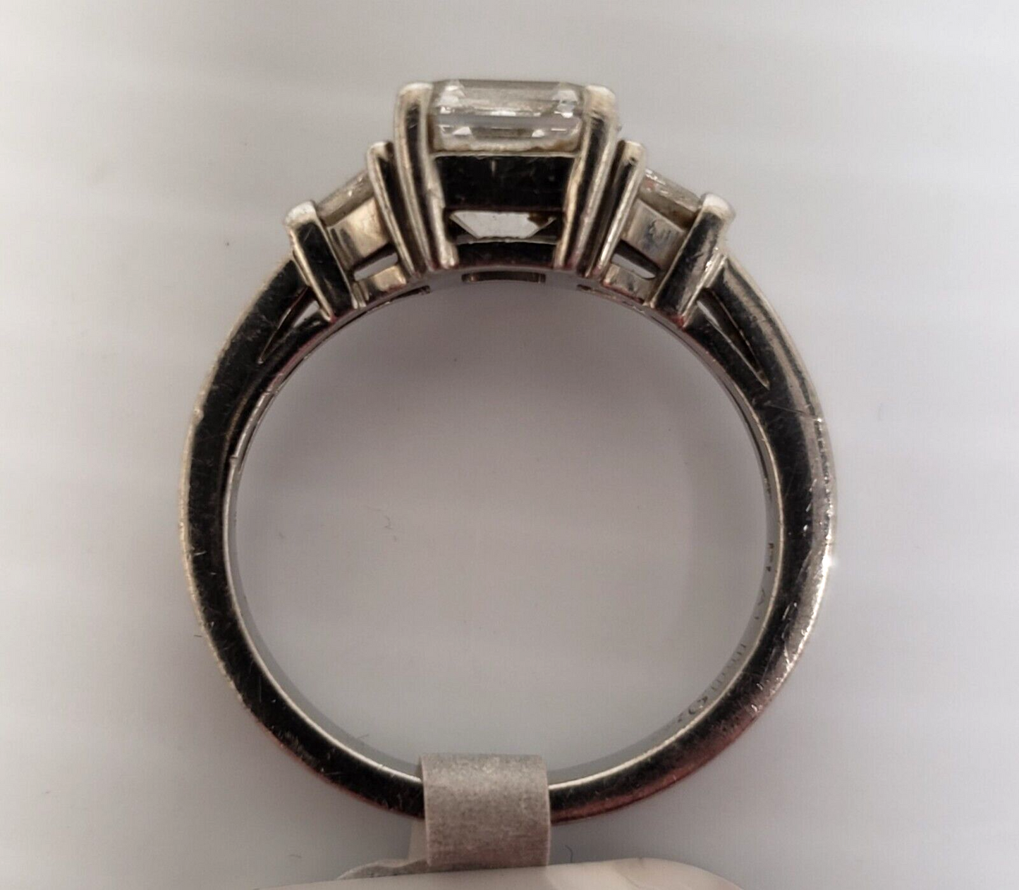 (28323-1-017A)   Platinum Ring With 1 Large and 2 Small Diamonds Size 6