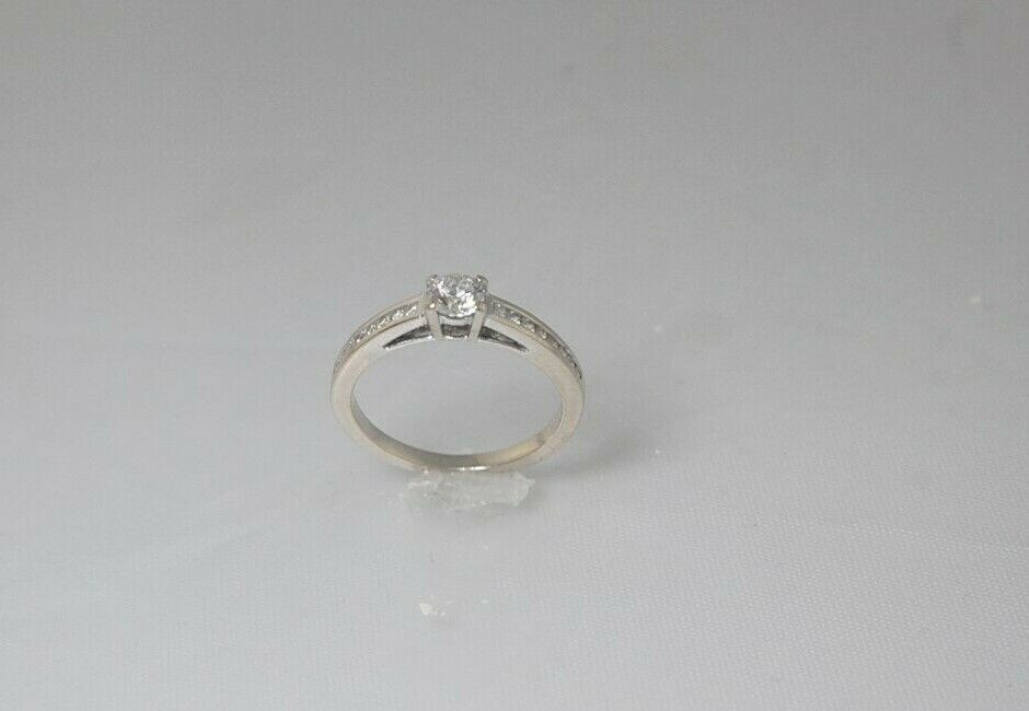 (I-4945-513)  14k white gold multistone Canadian diamond ring