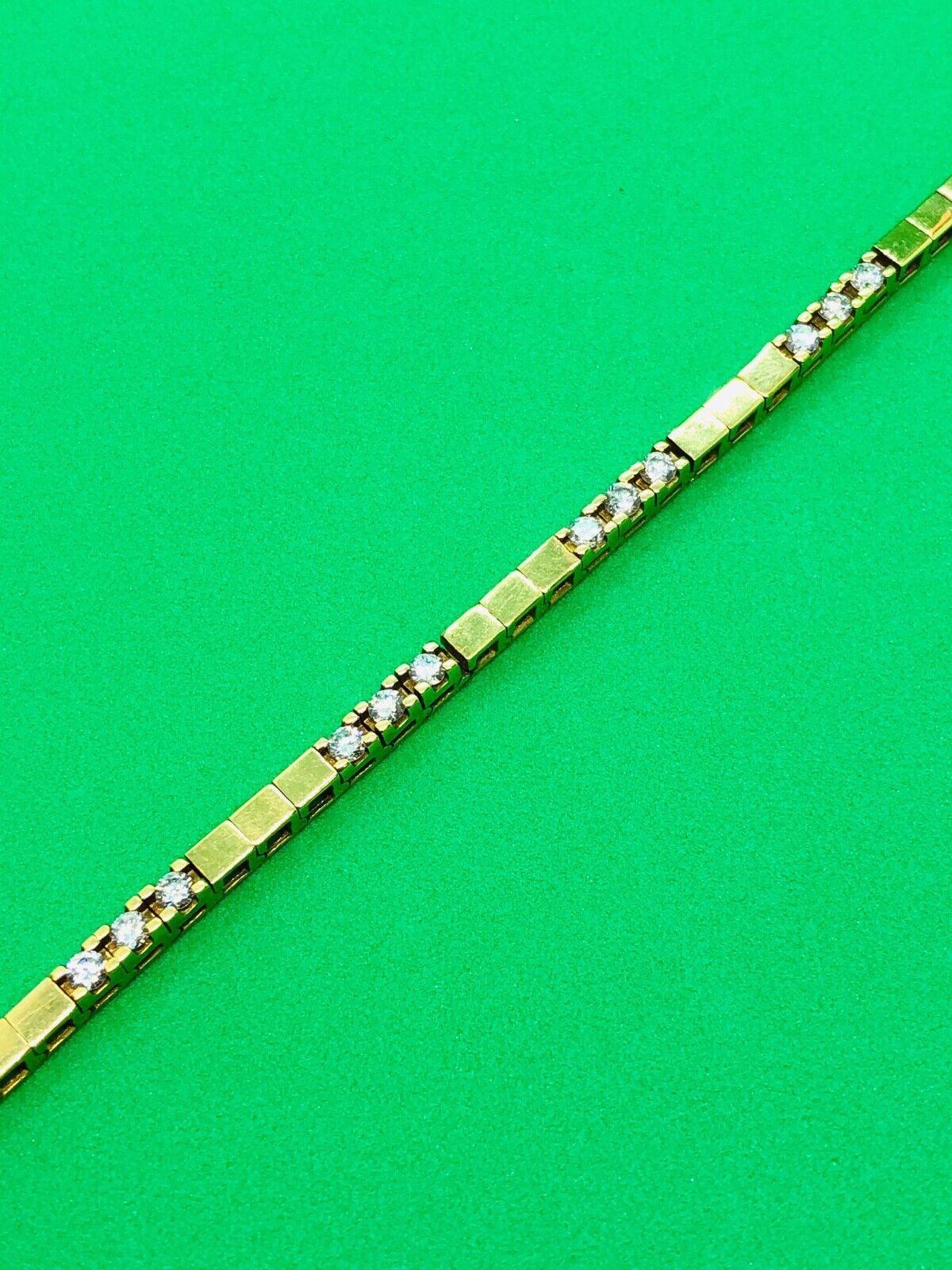 (N049041) Gold/Diamond Tennis Bracelet - 27 Diamonds, 18k Gold, 18.7grams