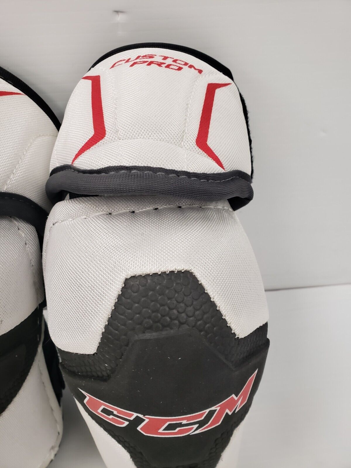 (46068-2) Coudières de hockey personnalisées CCM Pro