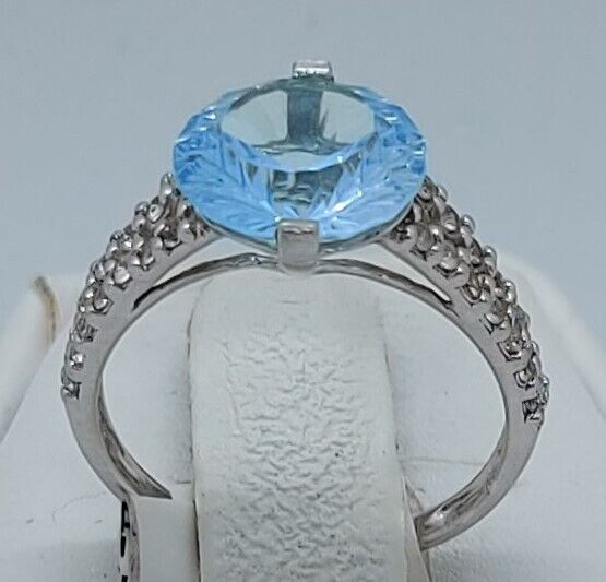 (N13604-3) 10K White Gold Ladies Ring 1 Blue Stone